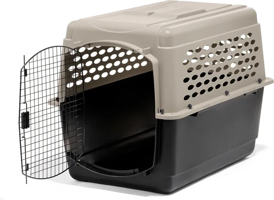 Plastic dog crate with a wire door